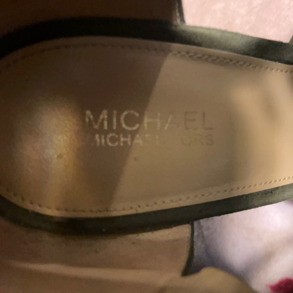 I am selling a pair of Michael Kors heels.Size 7.5